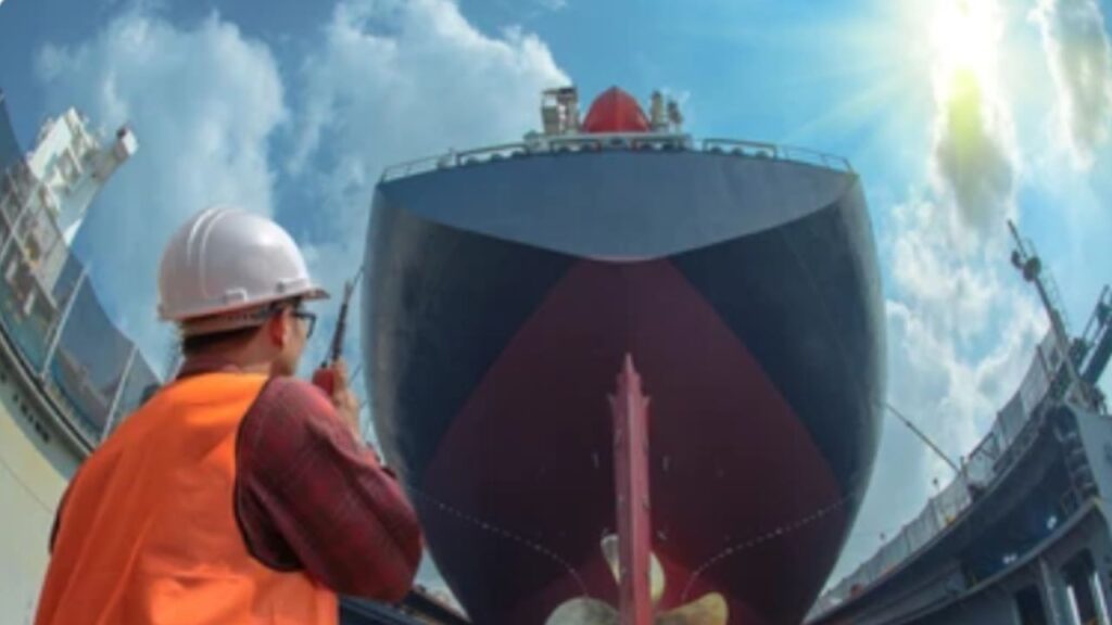 China Shipbuilding Dominance: Supervisor inspecting Shipbuilding process