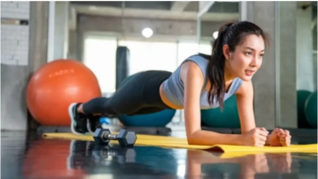 A girl exercising in Gym